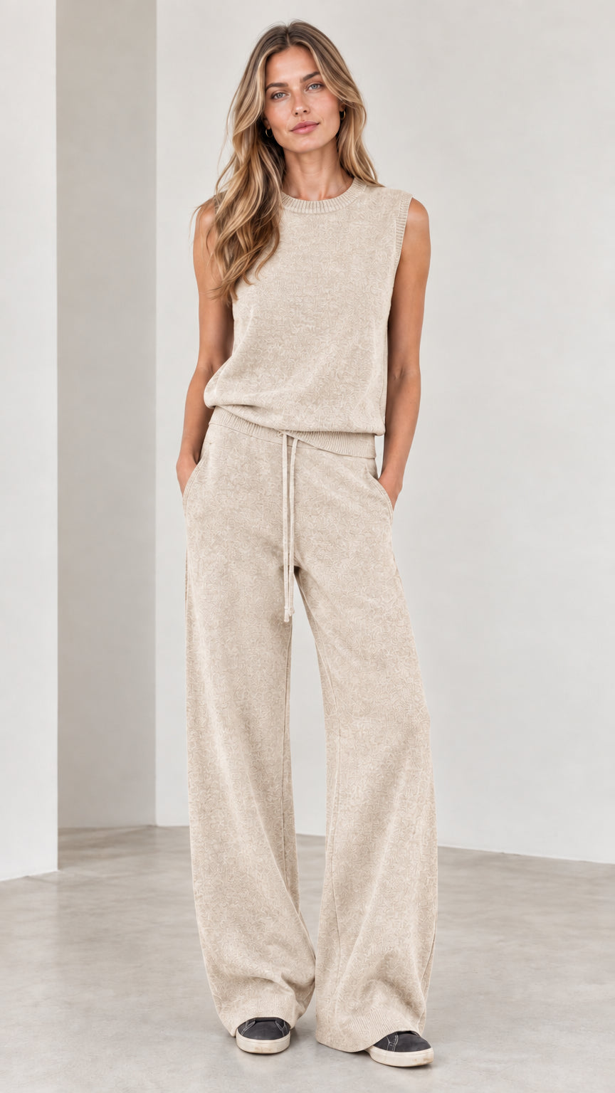 Full-body view of woman wearing Oatmeal sleeveless top and wide-leg knit pants set