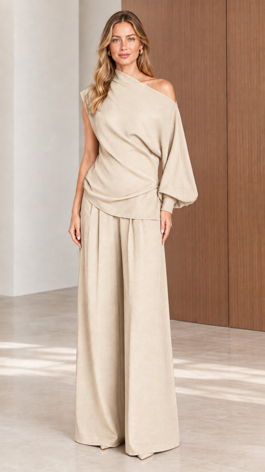 Front view of model wearing Beige cream asymmetrical one-shoulder wide-leg set