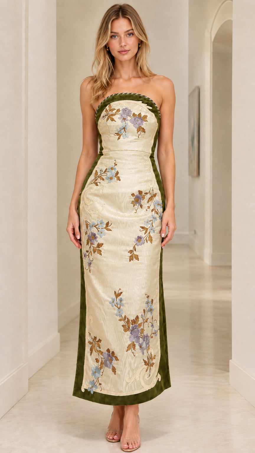 Front view of champagne strapless floral embroidered column gown