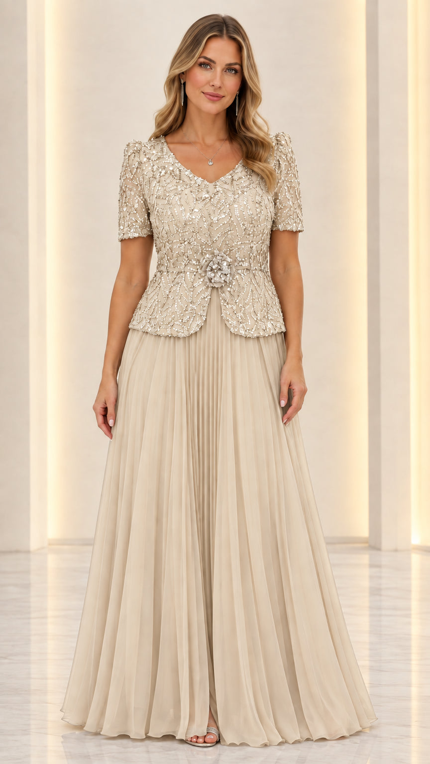 Full front view of champagne beige sequined pleated evening gown