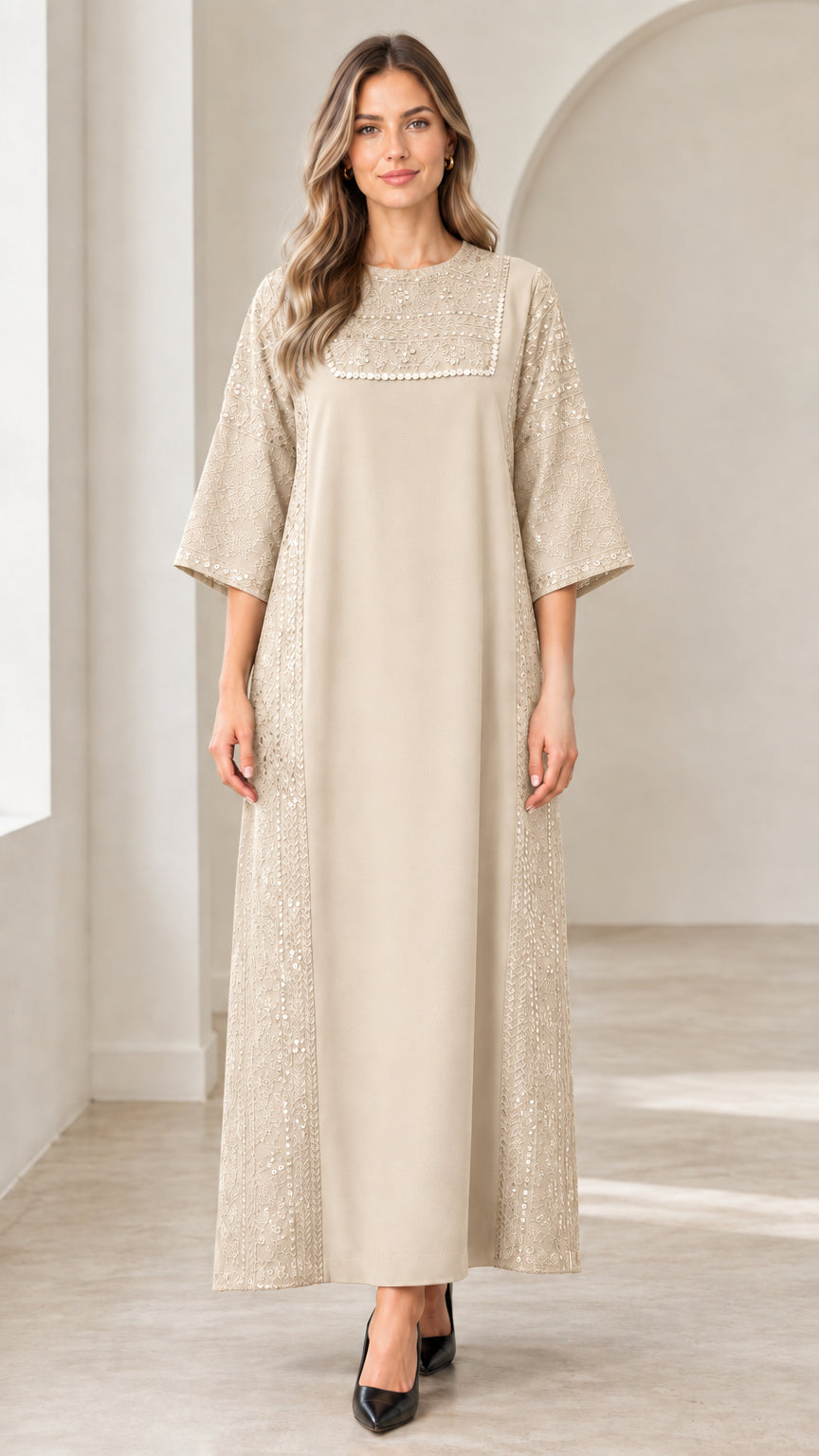 Front view of woman wearing beige champagne sequin embellished maxi dress
