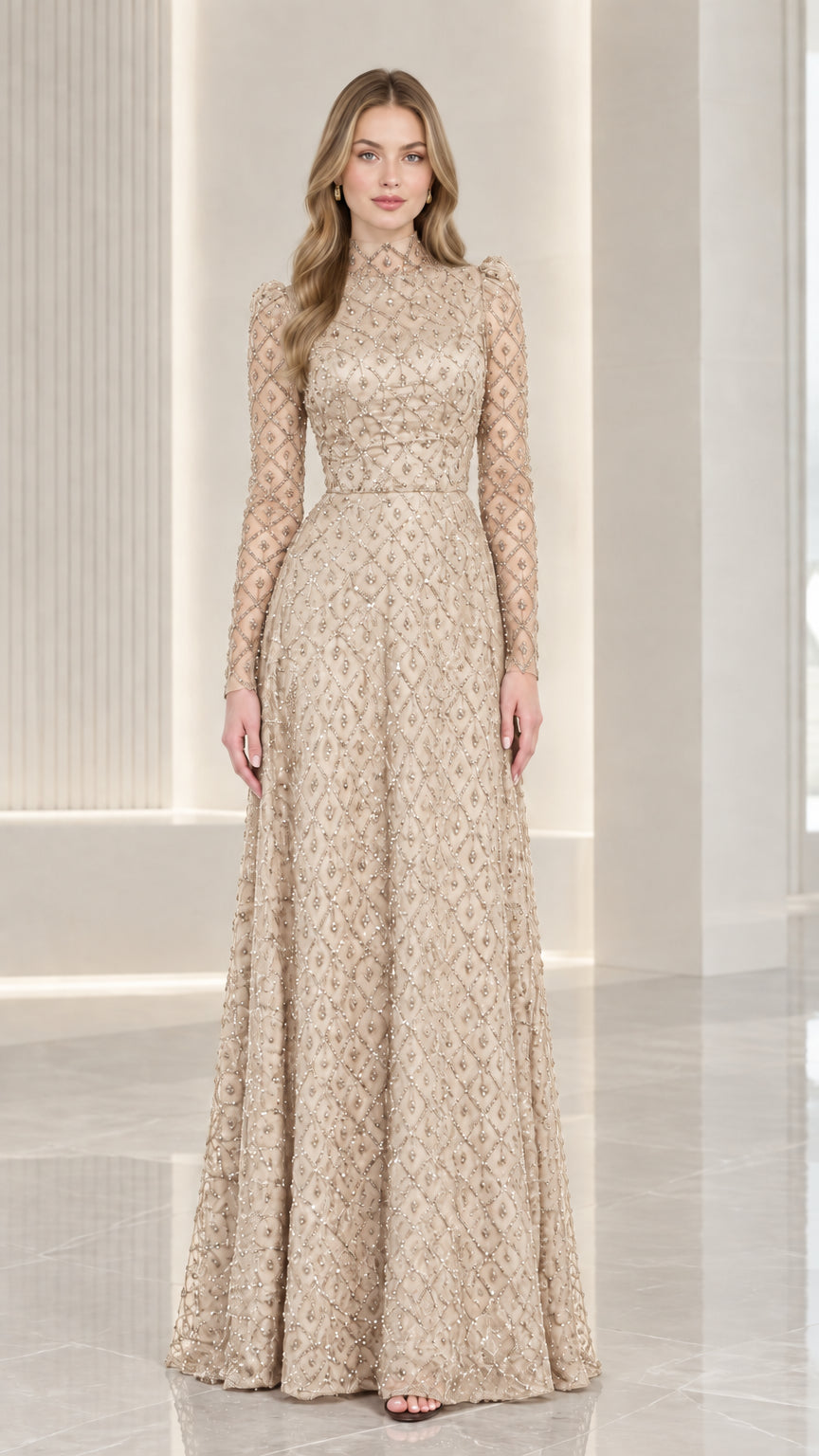 Front view of model wearing champagne gold high neck beaded long sleeve gown