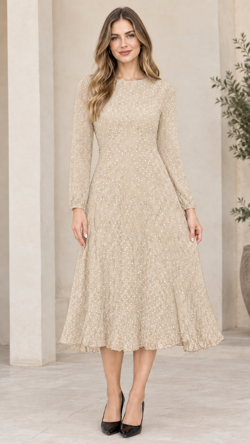 Front view of woman wearing beige champagne long sleeve micro dot A-line midi dress