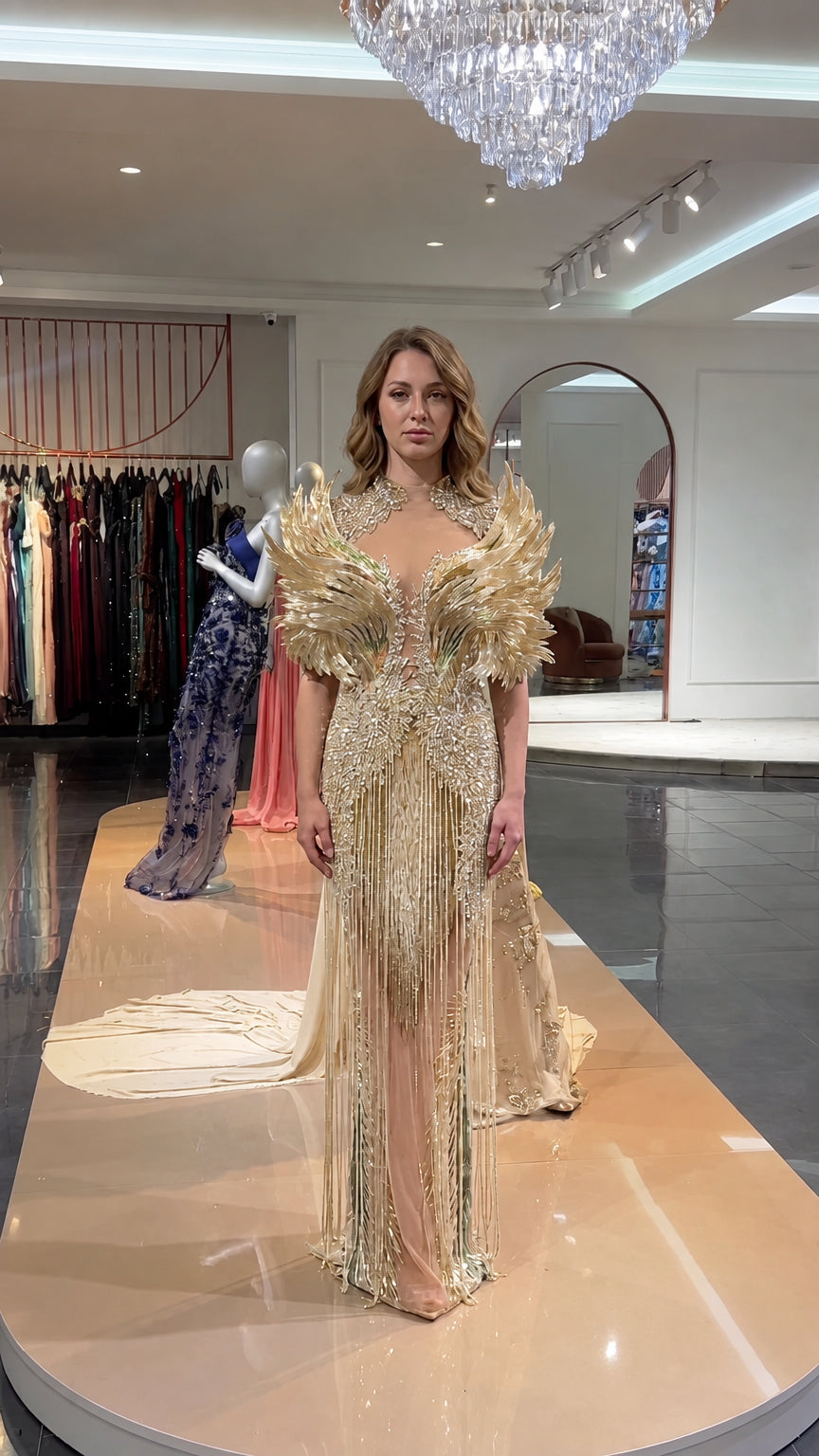 Front view of champagne gold embellished mermaid evening gown
