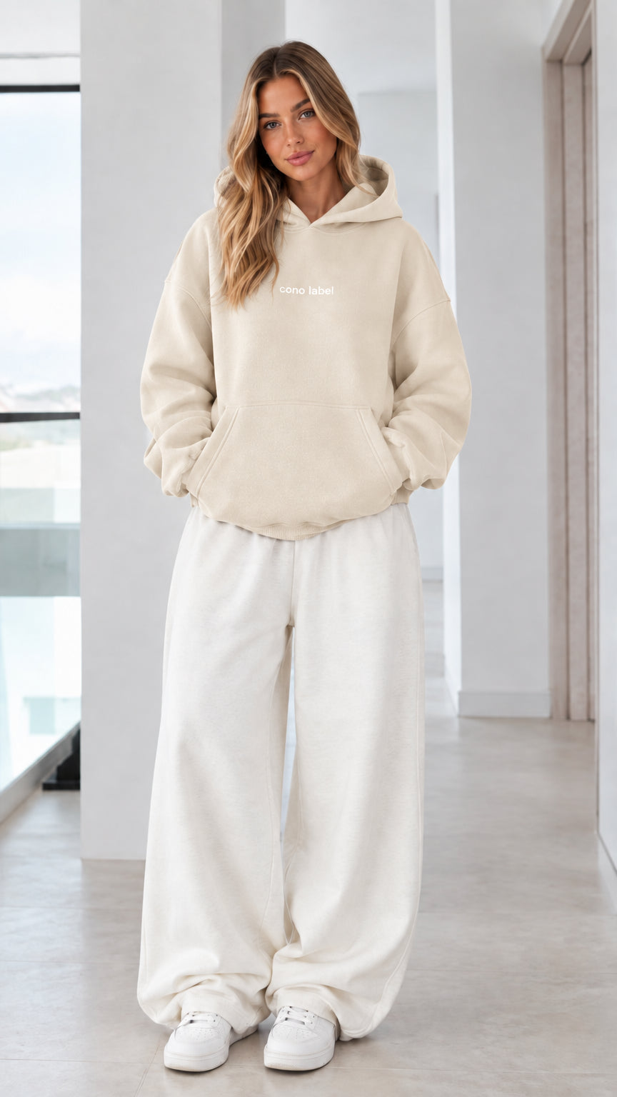 Women's beige cream oversized casual fleece hoodie on model