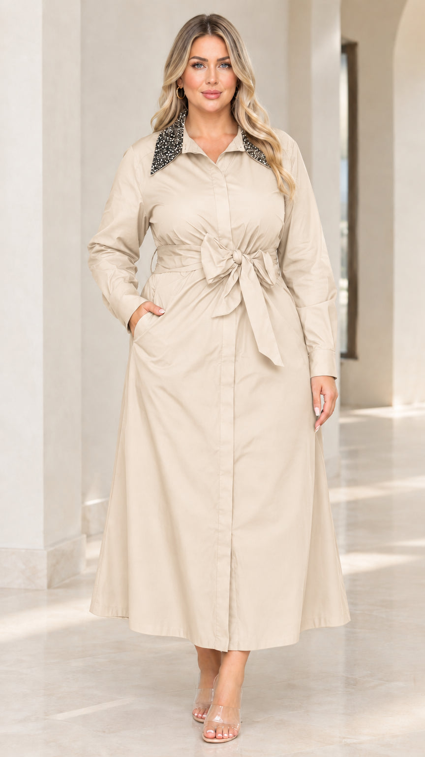 Front view of woman wearing beige khaki long sleeve belted maxi shirt dress