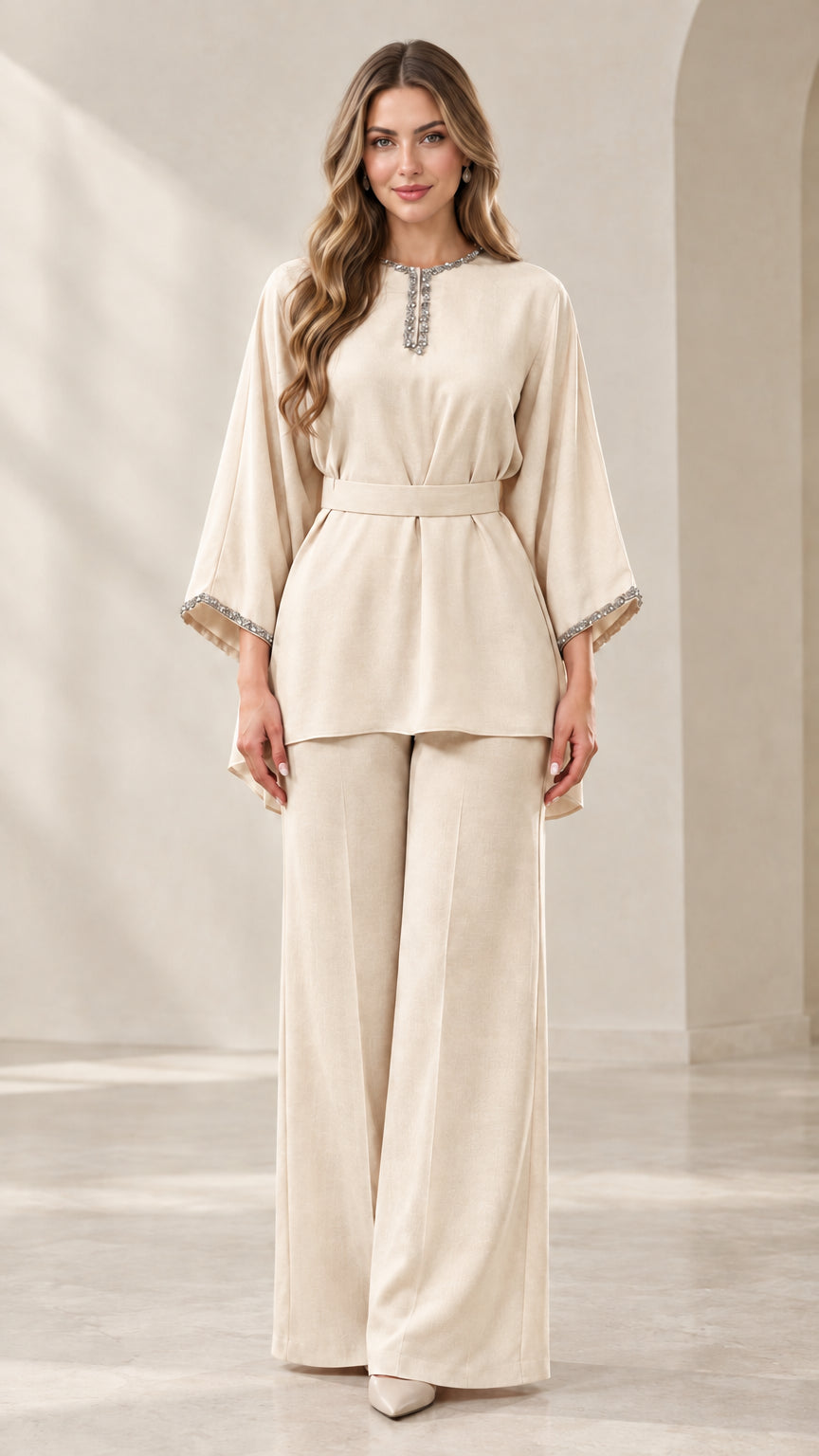 Full-length front view of champagne rhinestone-embellished tunic top and wide-leg pants set