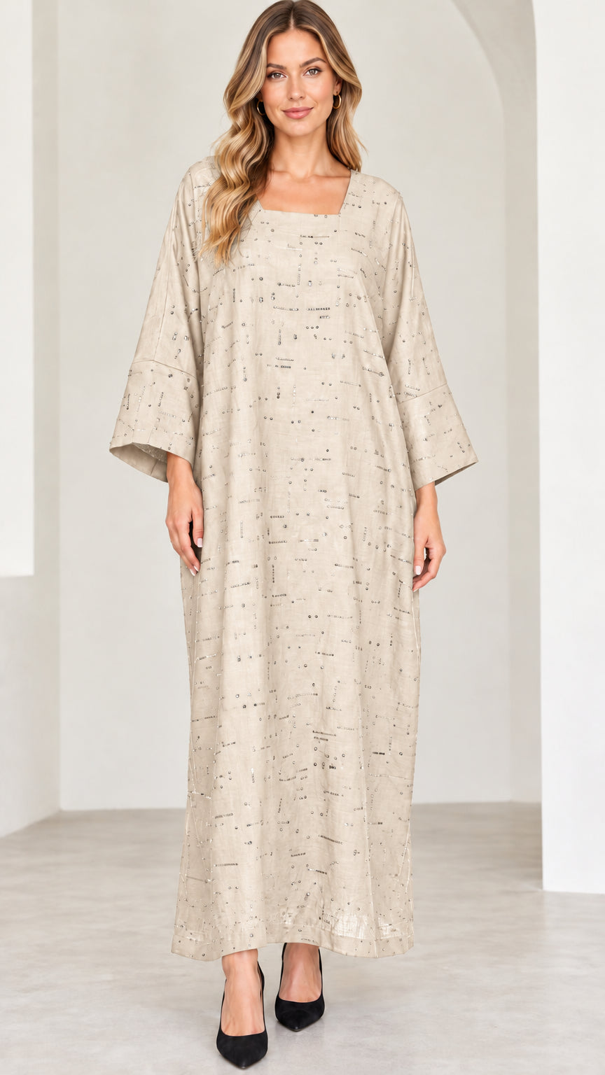 Model wearing beige champagne sequin kaftan dress