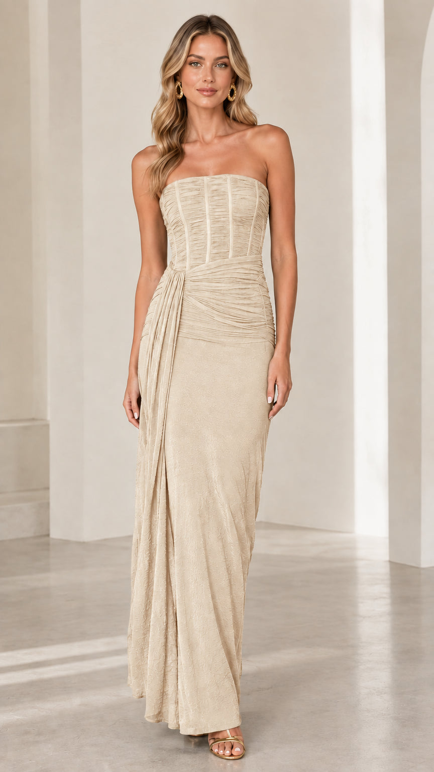 Full front view of champagne beige strapless corset draped maxi dress